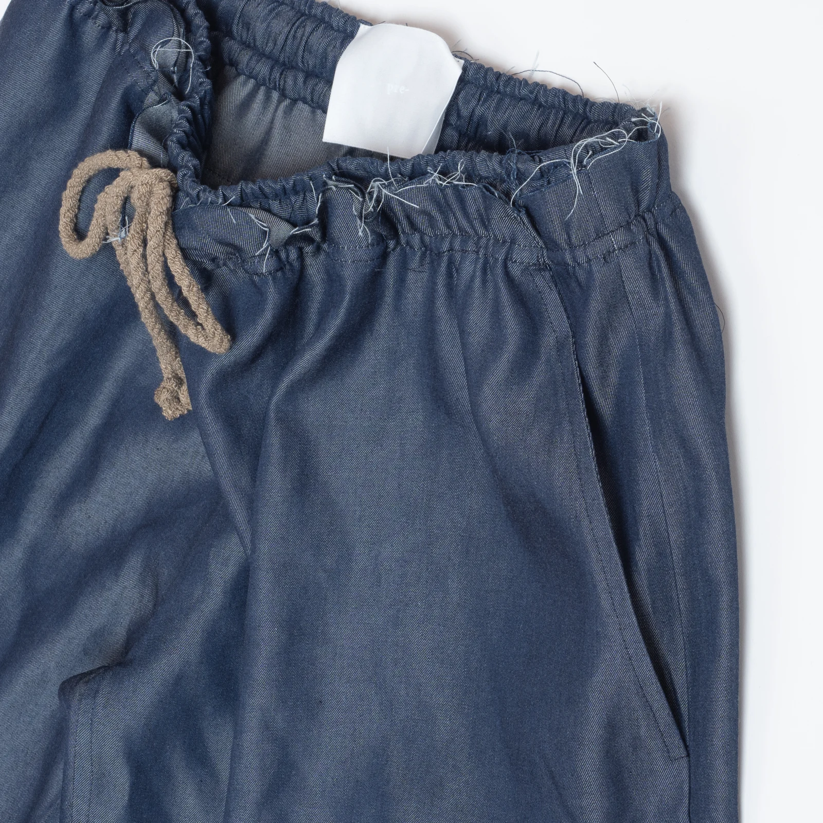 CUT OFF DENIM EASY PANTS